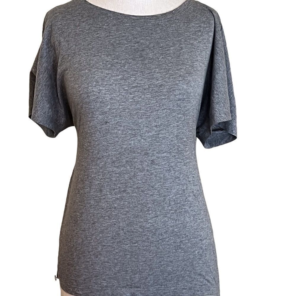 Simple gray T-shirt with open back.